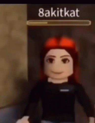 Girl With Red Hair In Front Of 8Akitkat Sign GIF