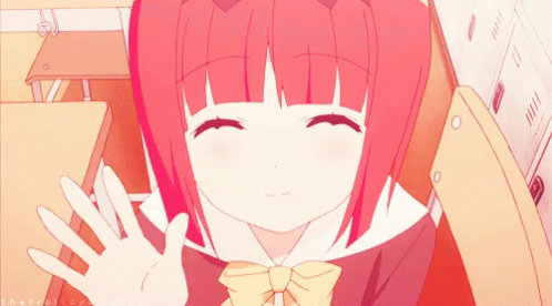 A Girl With Red Hair Is Waving Her Hand In Front Of A Locker With The Letters Eh On It GIF