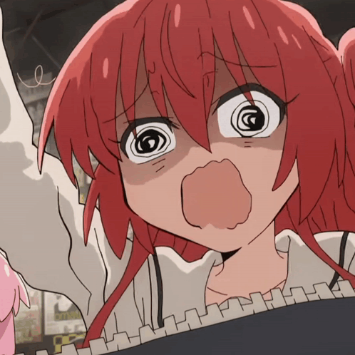 A Girl With Red Hair Making A Funny Face GIF