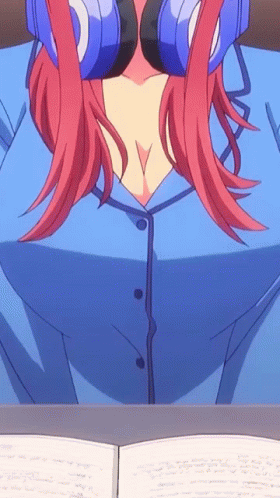 A Girl With Red Hair Wearing Headphones And A Blue Shirt GIF