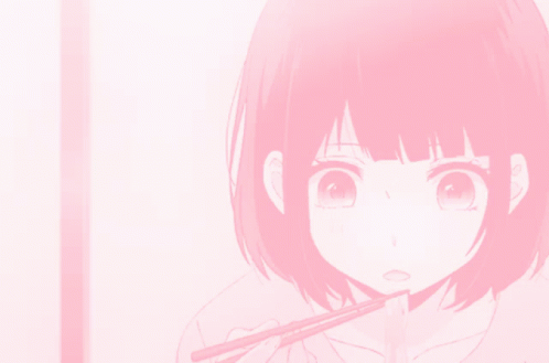 A Girl With Short Pink Hair Is Eating With Chopsticks GIF
