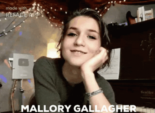 a girl with the name mallory gallagher written on her face
