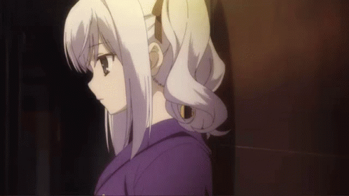 A Girl With White Hair And A Ponytail Is Standing In A Dark Room GIF