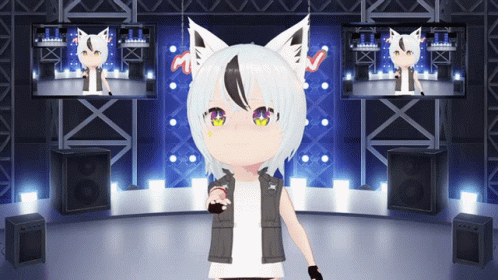 A Girl With White Hair And Black Ears Is Standing On A Stage In Front Of Two Monitors GIF