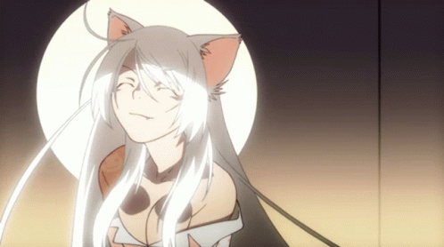 A Girl With White Hair And Cat Ears Looks At The Camera GIF
