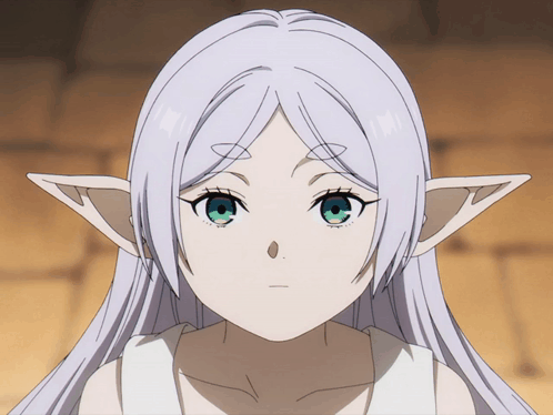 A Girl With White Hair And Elf Ears Has A Serious Look On Her Face GIF