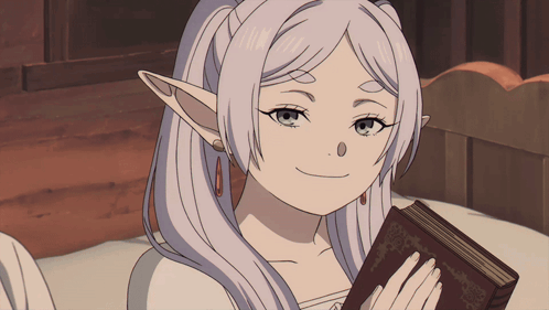 a girl with white hair is holding a book