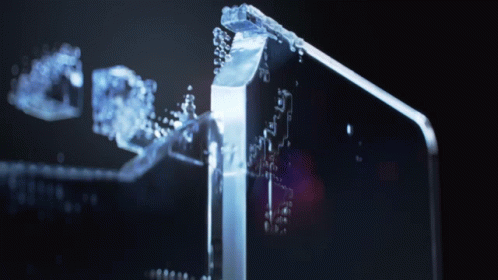 A Glass Block With A Few Pieces Of Ice On It GIF