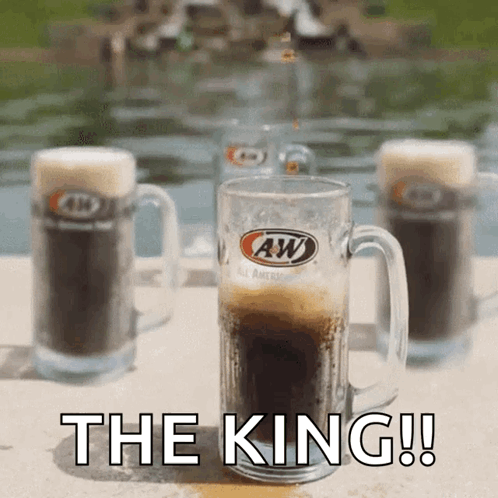 A Glass Of A&w Beer With The Words The King Written Below It GIF
