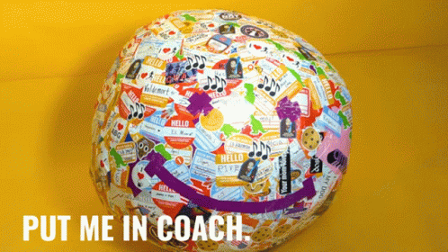 A Globe With Stickers On It And The Words Put Me In Coach GIF
