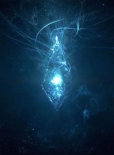 A Glowing Object Is Floating In The Dark GIF