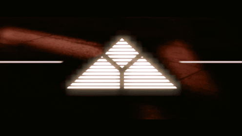A Glowing Triangle With A Red Background GIF