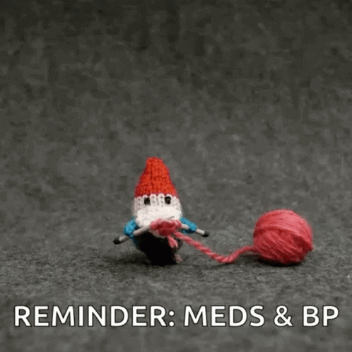 A Gnome Is Holding A Ball Of Yarn With The Words Reminder : Meds & Bp Below It . GIF
