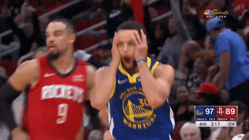 A Golden State Warriors Basketball Player Holds His Head GIF