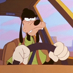 A Goofy Cartoon Character Is Driving A Car And Giving A Thumbs Up GIF