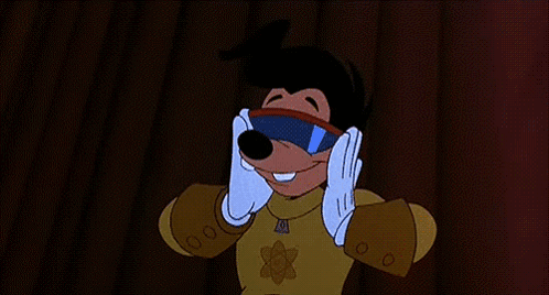 A Goofy Cartoon Character Is Wearing A Superhero Costume And Giving A Thumbs Up GIF