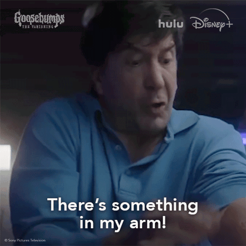 A Goosebumps Advertisement Shows A Man Screaming And Saying There 'S Something In My Arm GIF