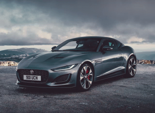 A Gray Sports Car With The License Plate 901 Ucn GIF
