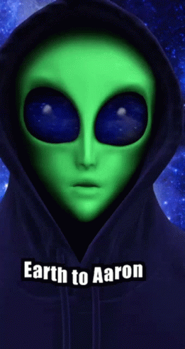 A Green Alien Wearing A Blue Hoodie With The Words " Earth To Aaron " Below It GIF