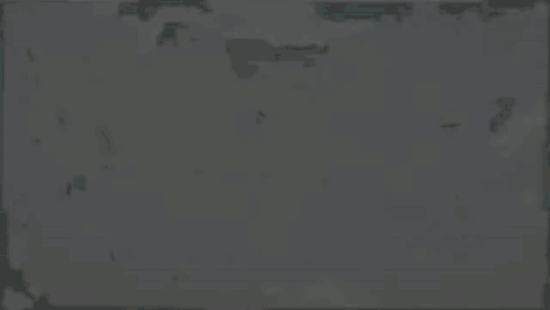 A Green And A Blue Ring Are Floating In The Air . GIF
