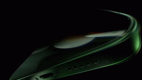A Green And Black Background With A Few Lines Of Light GIF