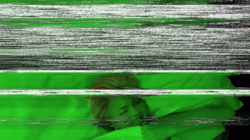 A Green And White Striped Background With A Person Sleeping On It GIF