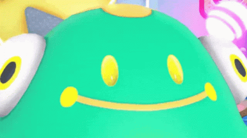 A Green And Yellow Cartoon Character With A Big Smile On His Face GIF