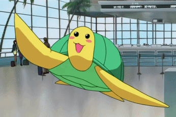 A Green And Yellow Turtle Is Flying Through An Airport Terminal GIF