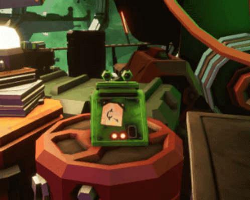 A Green Box With The Letter C On It Sits On Top Of A Red Object GIF