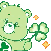 a green care bear holding a green clover