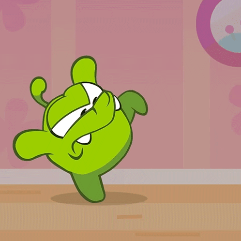 A Green Cartoon Character Is Dancing In A Room GIF