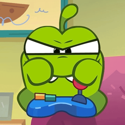A Green Cartoon Character Is Playing A Video Game With A Controller GIF