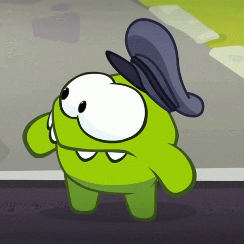 A Green Cartoon Character Is Wearing A Hat GIF