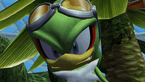 A Green Cartoon Character Wearing Goggles Is Looking At The Camera GIF
