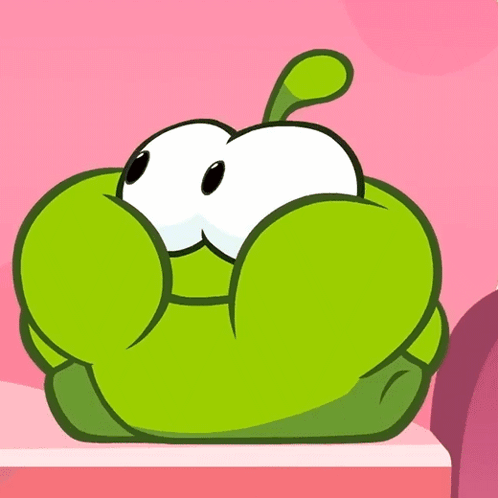 A Green Cartoon Character With Big Eyes And A Large Mouth GIF