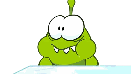 a green cartoon character with flames coming out of his mouth