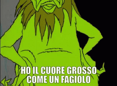 A Green Cartoon Character With The Words Ho Il Cuore Grosso Come Un Fagiolo Below Him GIF