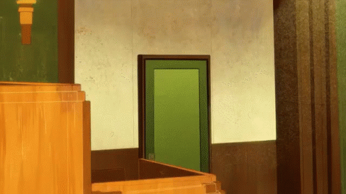 A Green Door Is Open In A Room With Stairs GIF