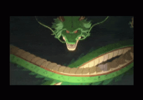 A Green Dragon With A Very Long Tail Is Flying In The Dark GIF