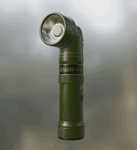 A Green Flashlight Is Sitting On A Table GIF