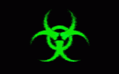 A Green Glowing Biohazard Sign On A Black Background . GIF