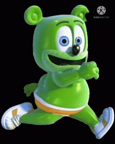 A Green Gummy Bear Is Running On A Black Background . GIF