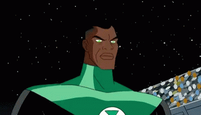 A Green Lantern Symbol Is Glowing In The Dark On A Blue Background . GIF