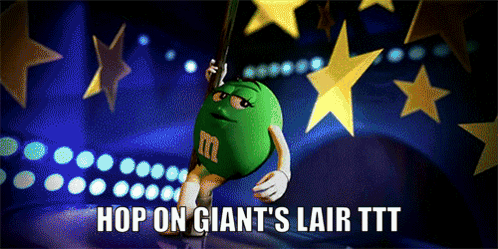 A Green M & M Holding A Stripper Pole With The Caption Hop On Giant 'S Lair Ttt GIF