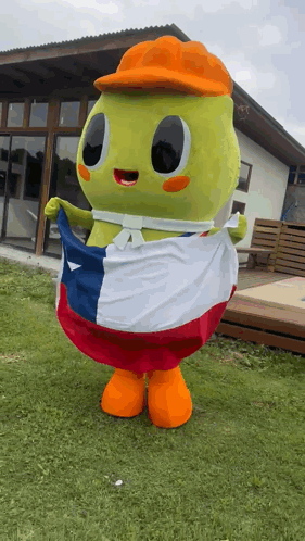 A Green Mascot Is Holding A Mexican Flag GIF