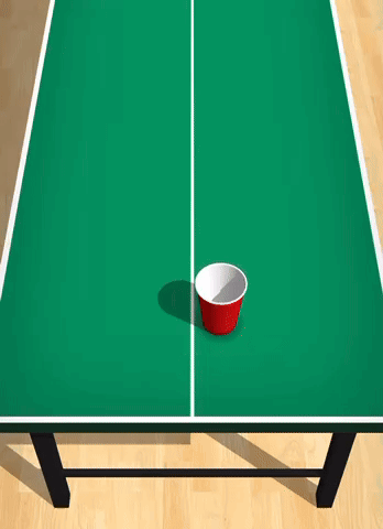 A Green Ping Pong Table With A Red Cup In The Middle GIF
