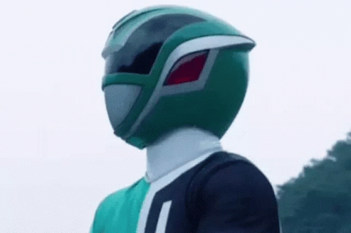 a green power ranger is wearing a green helmet and a green shirt .