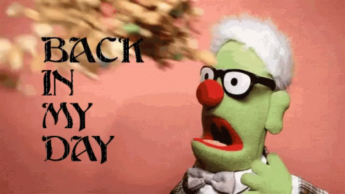 A Green Puppet Says Back In My Day GIF