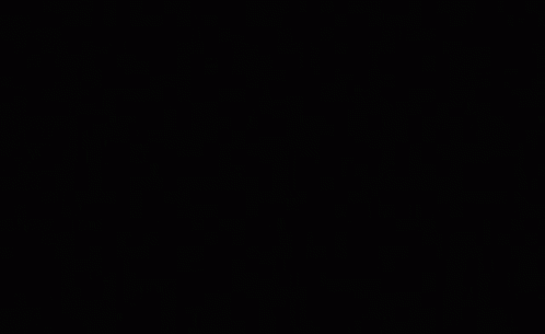 A Green Question Mark Is Displayed On A Black Background GIF