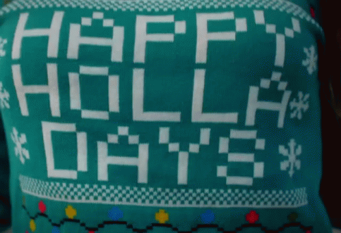 A Green Sweater That Says Happy Holla Days GIF